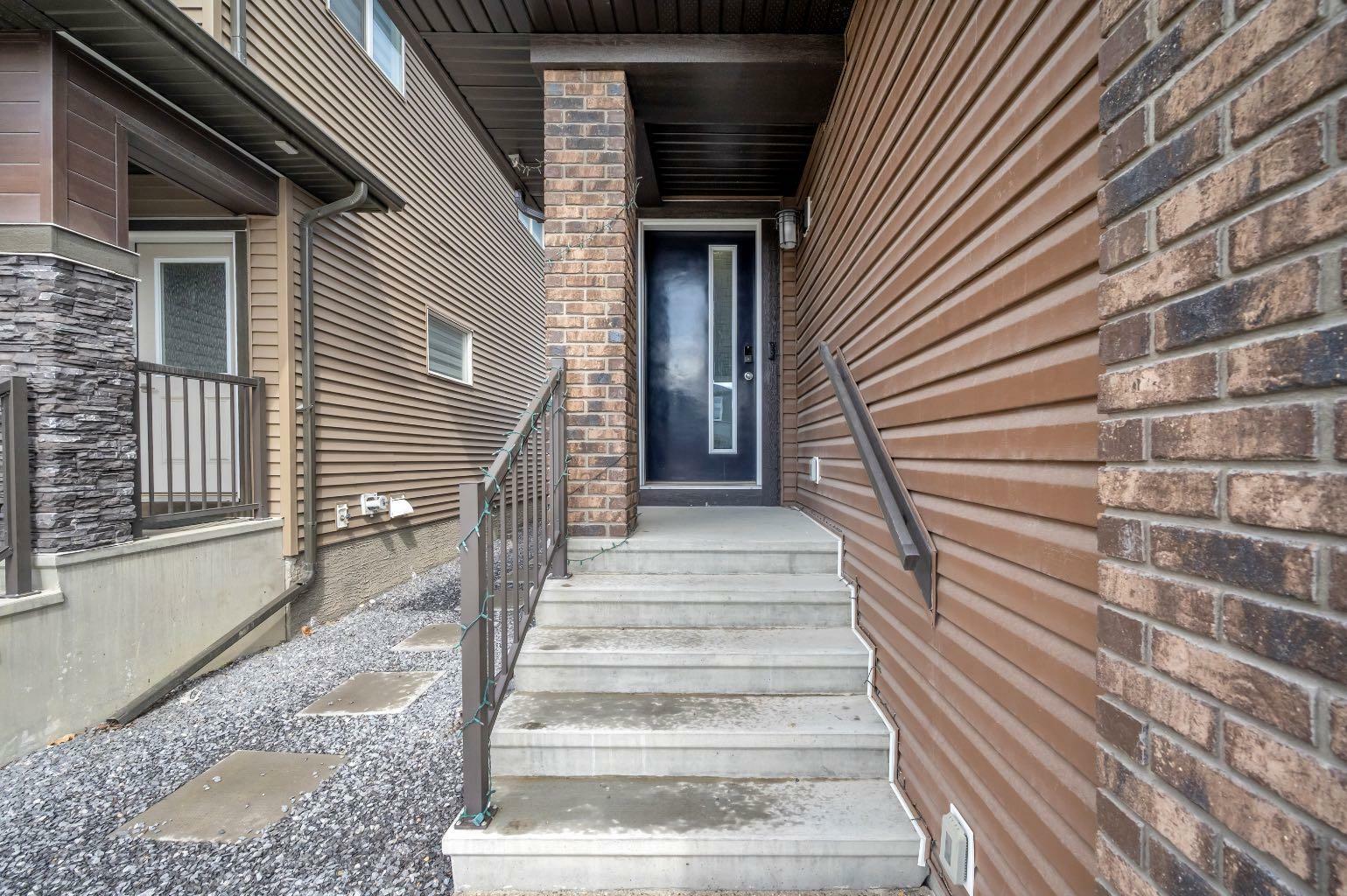 Property Photo: 327 Savanna Way NE AB T3J 2H6