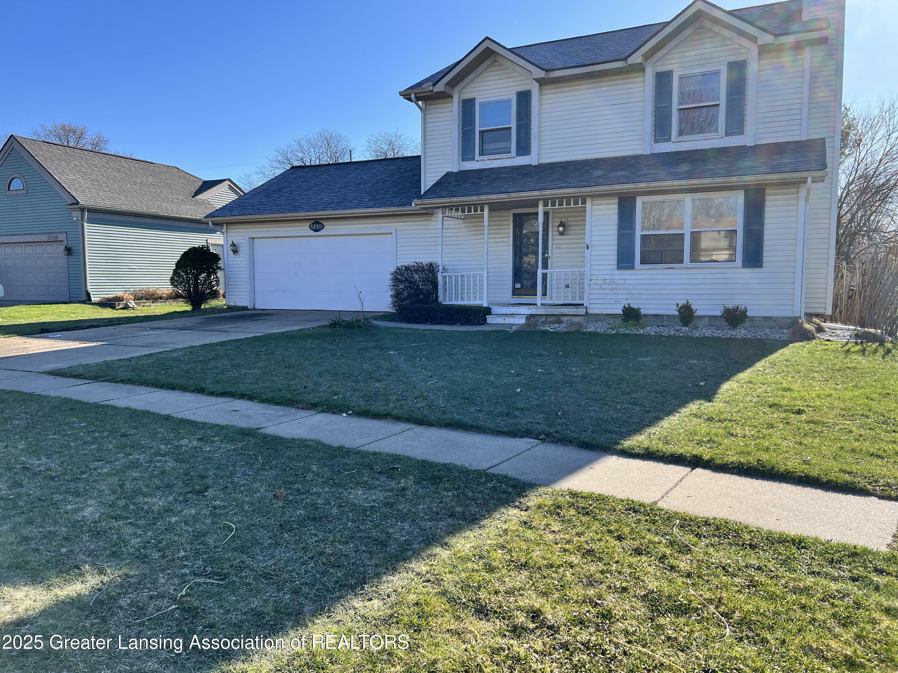 Property Photo: 1210 Wolf Run Drive MI 48917