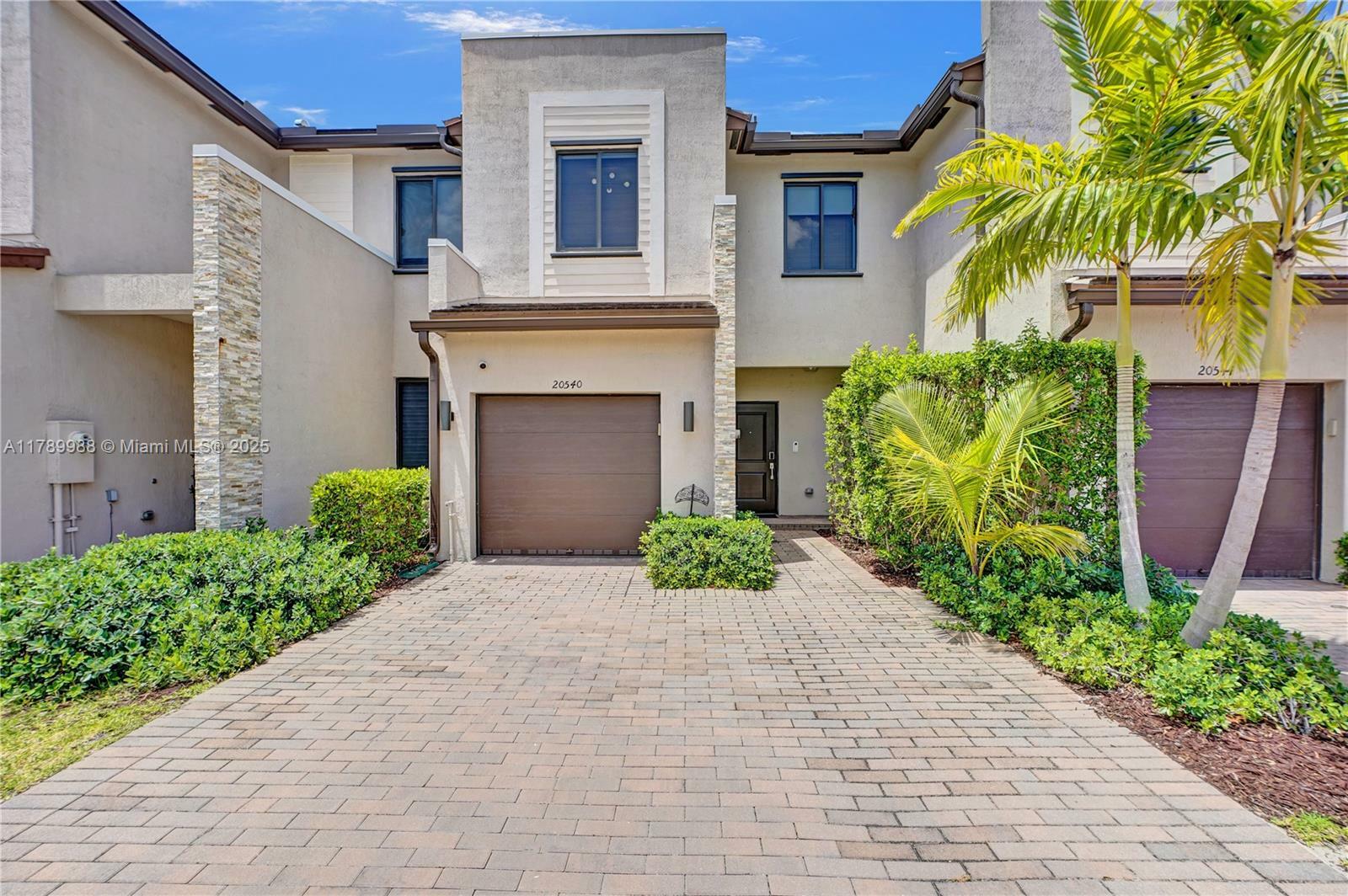 Property Photo: 20540 NE 5th Pl FL 33179