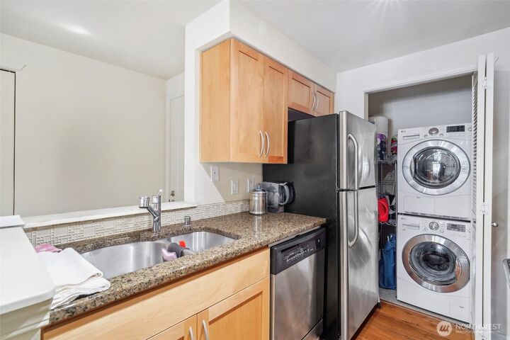 Property Photo:  3045  20th Avenue W 208  WA 98199 