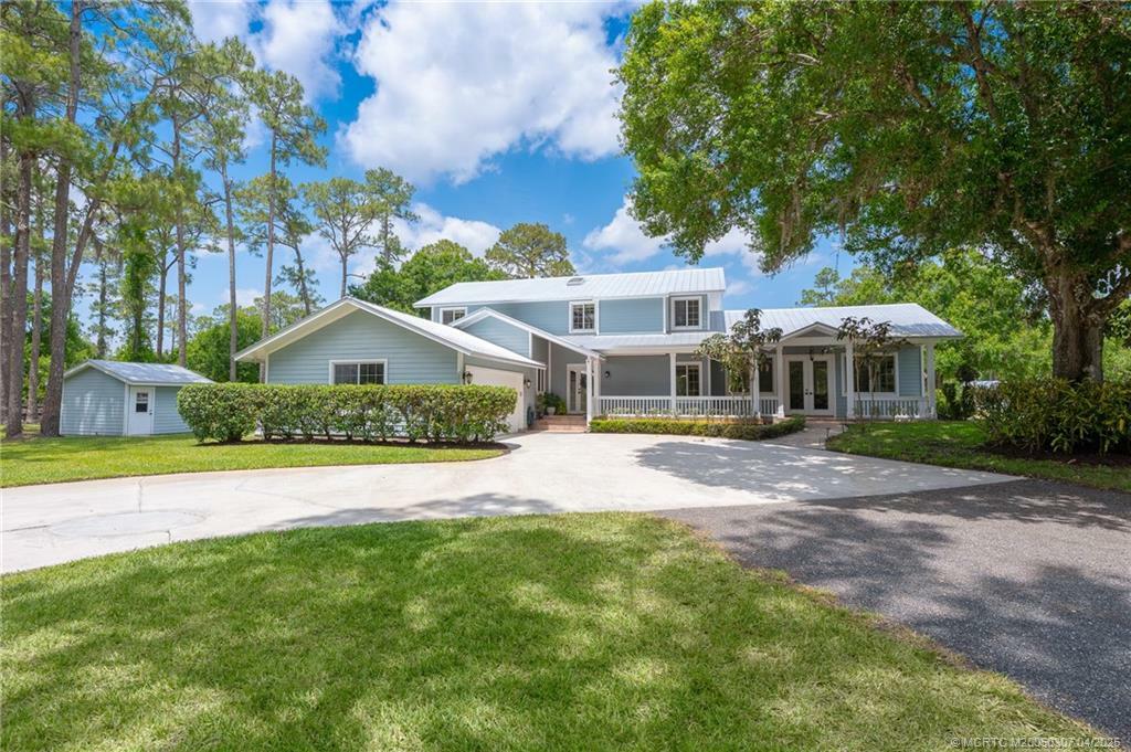 Property Photo: 6955 SW Woodbine Way FL 34990