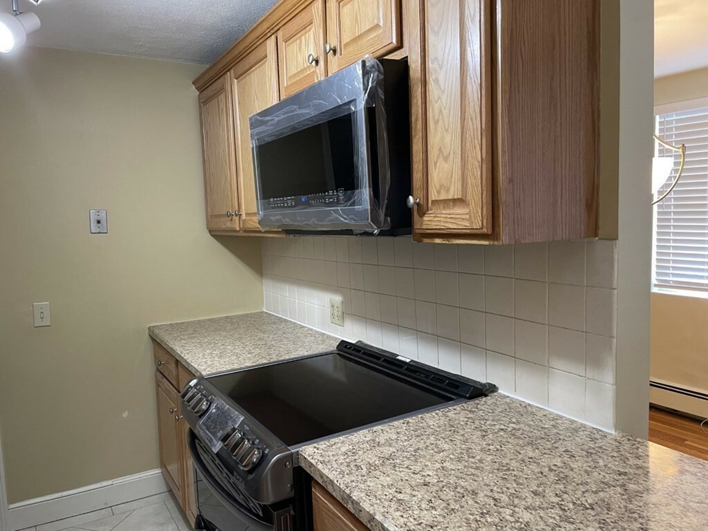 Property Photo: 134 Emerson Gardens Rd 134 MA 02420
