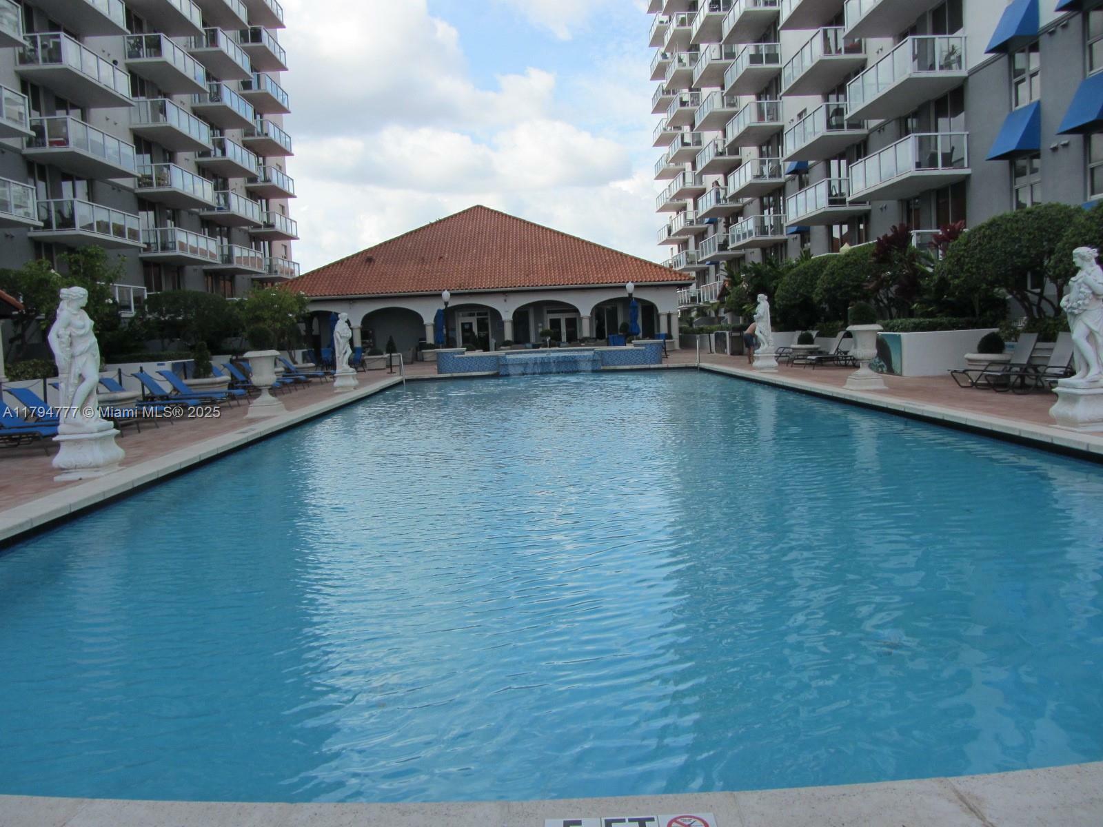 Property Photo: 5077 NW 7 1211 FL 33126