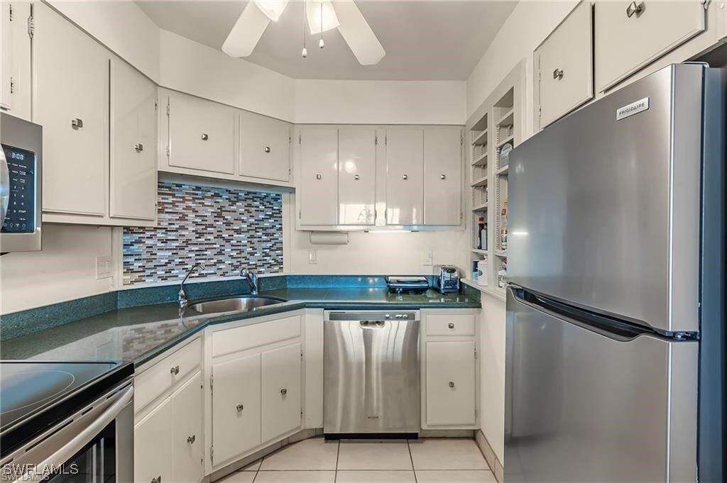 Property Photo:  5 Bluebill Avenue 403  FL 34108 