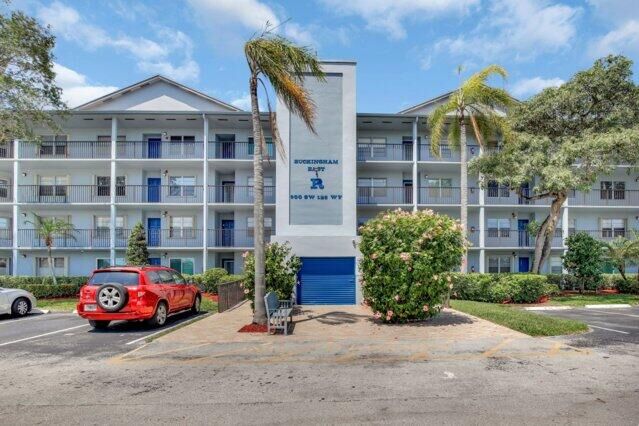 Property Photo:  900 SW 125th Way 212  FL 33027 