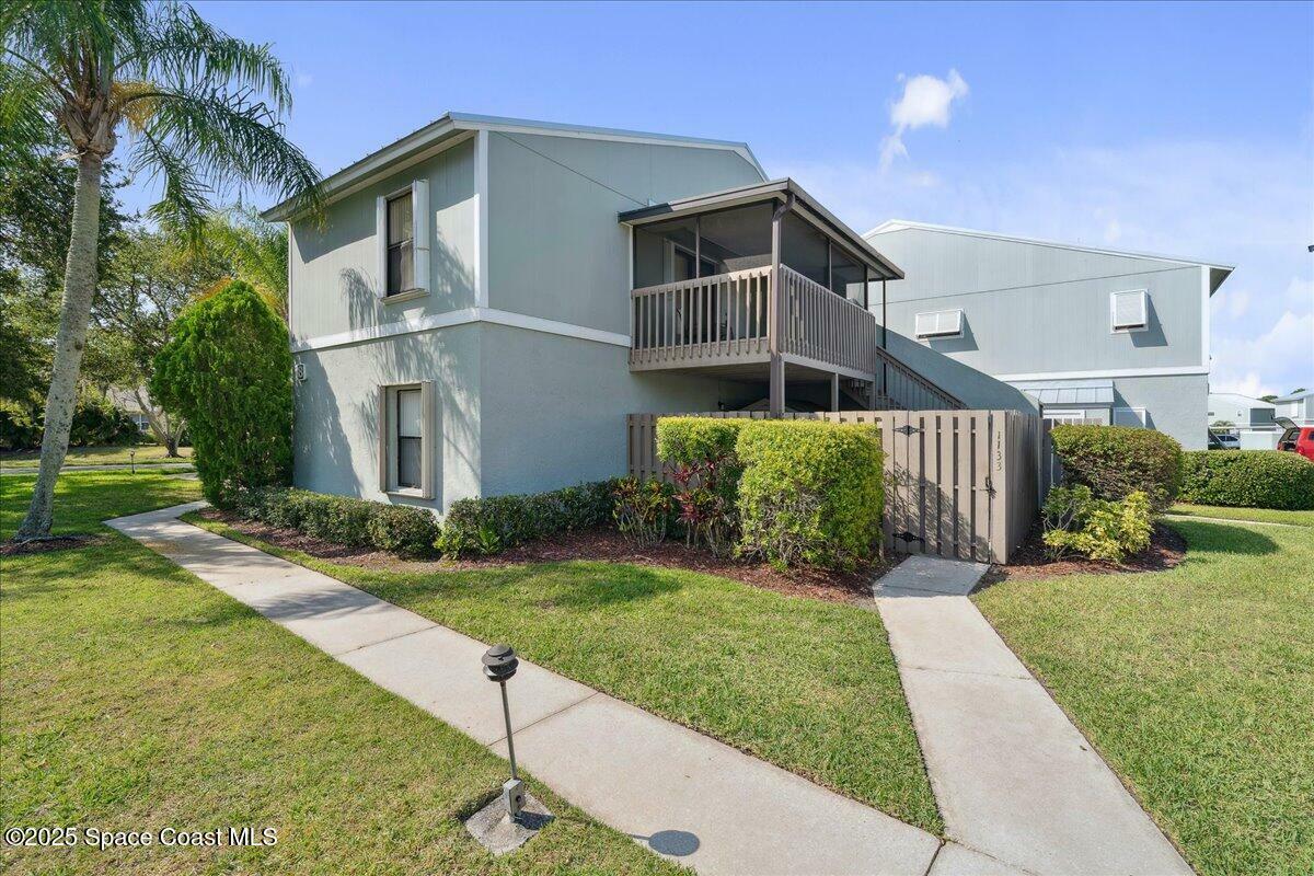 Property Photo: 1133 Breezy Way FL 32958