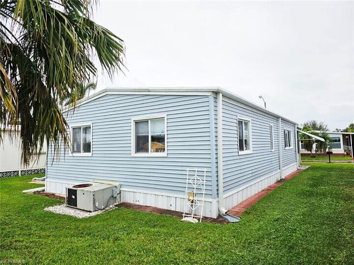 Property Photo:  102 Poinsettia Dr  FL 33905 