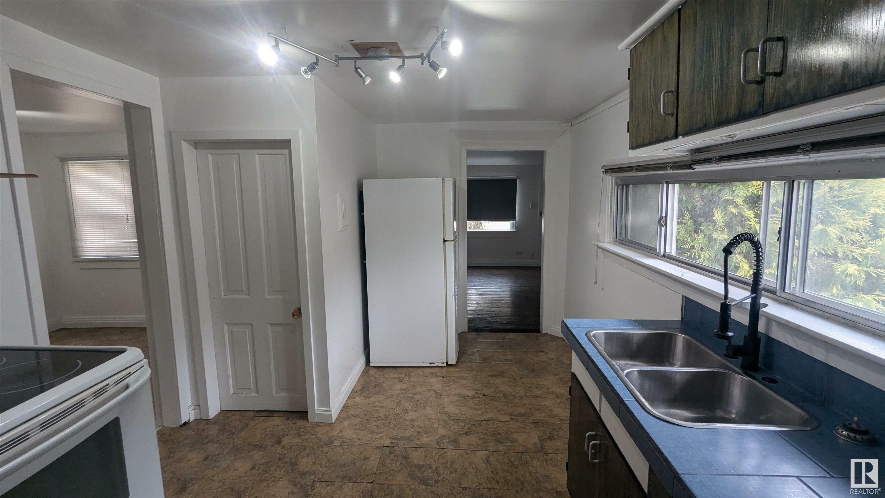 Property Photo: 4410 48A Street AB T9C 1A8