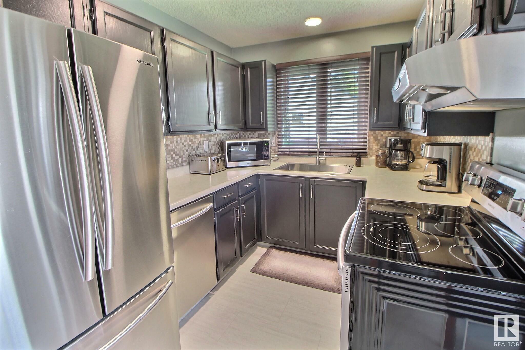 Property Photo: 2407 145 Avenue NW AB T5Y 2J5