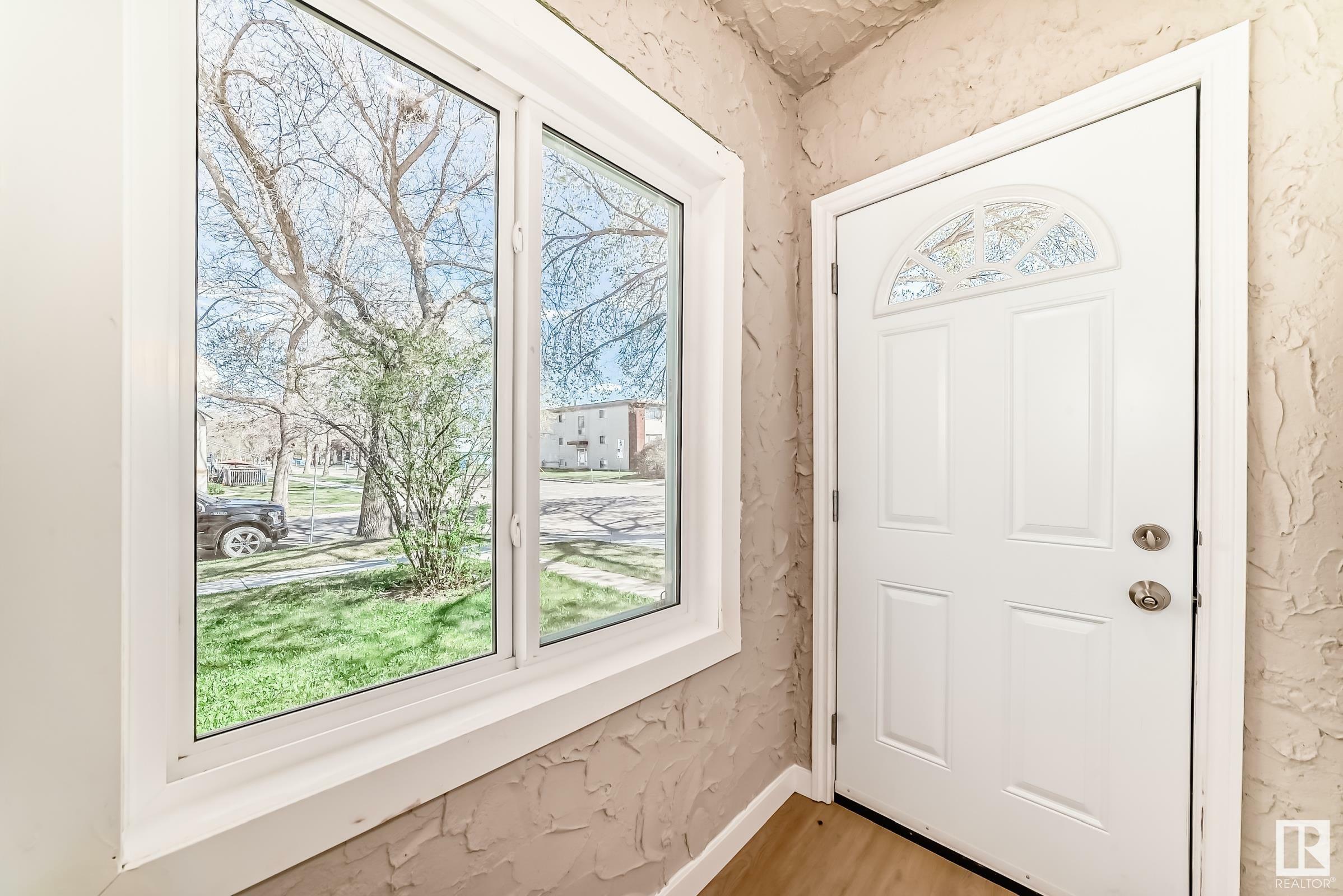 Property Photo:  11902 90 Street NW  AB T5B 3Y9 