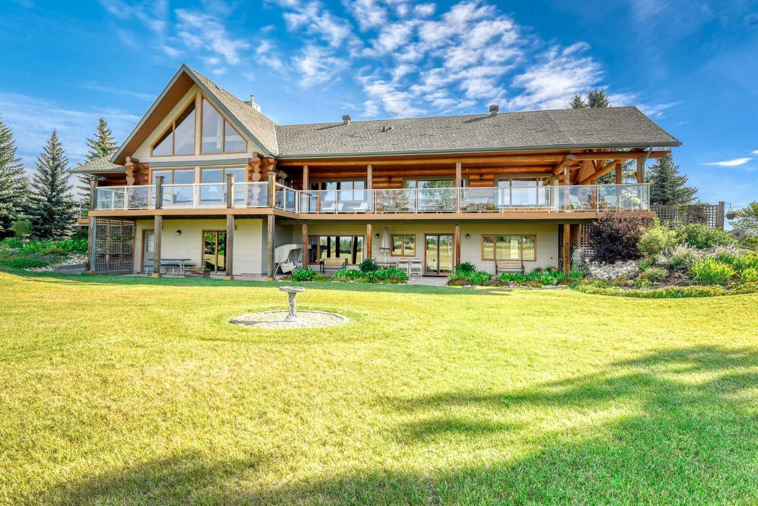 Property Photo: 226101 88 Street E AB T1S 3Y2