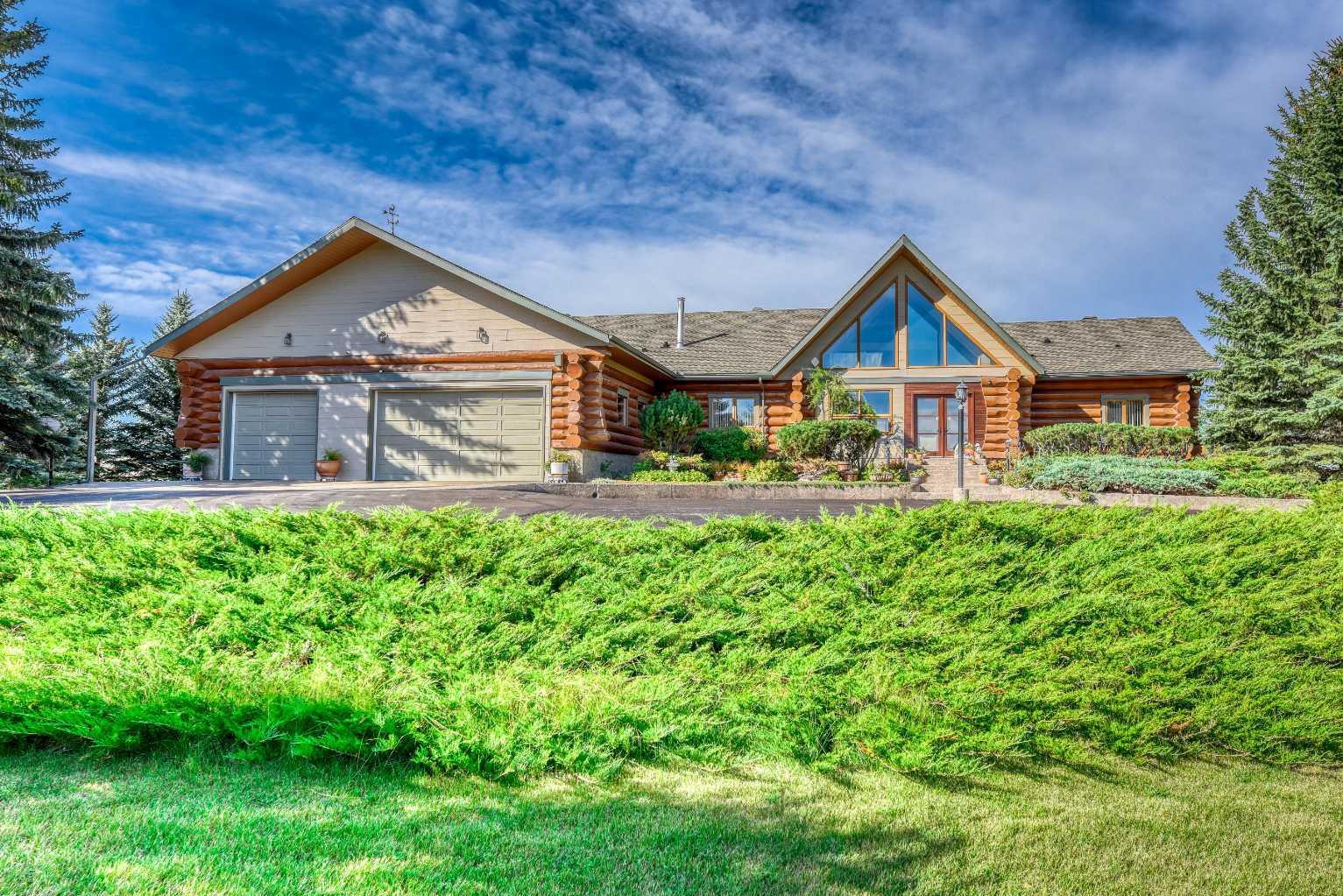 Property Photo:  226101 88 Street E  AB T1S 3Y2 