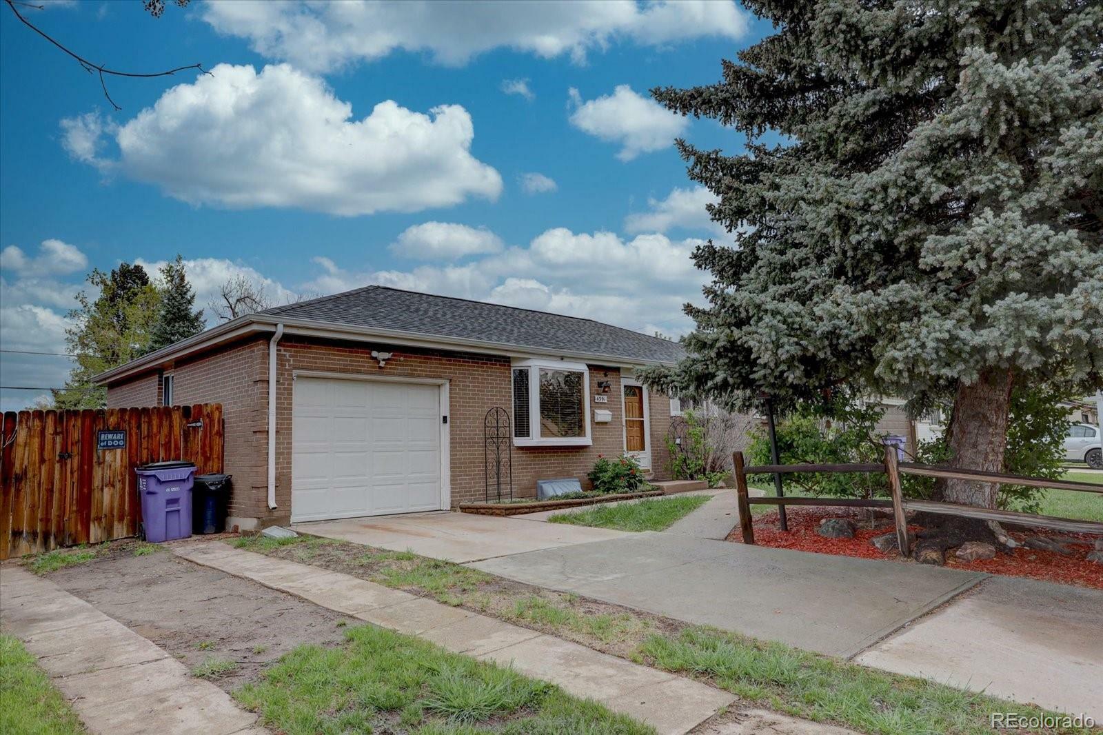 Property Photo: 4391 W Tufts Avenue CO 80236