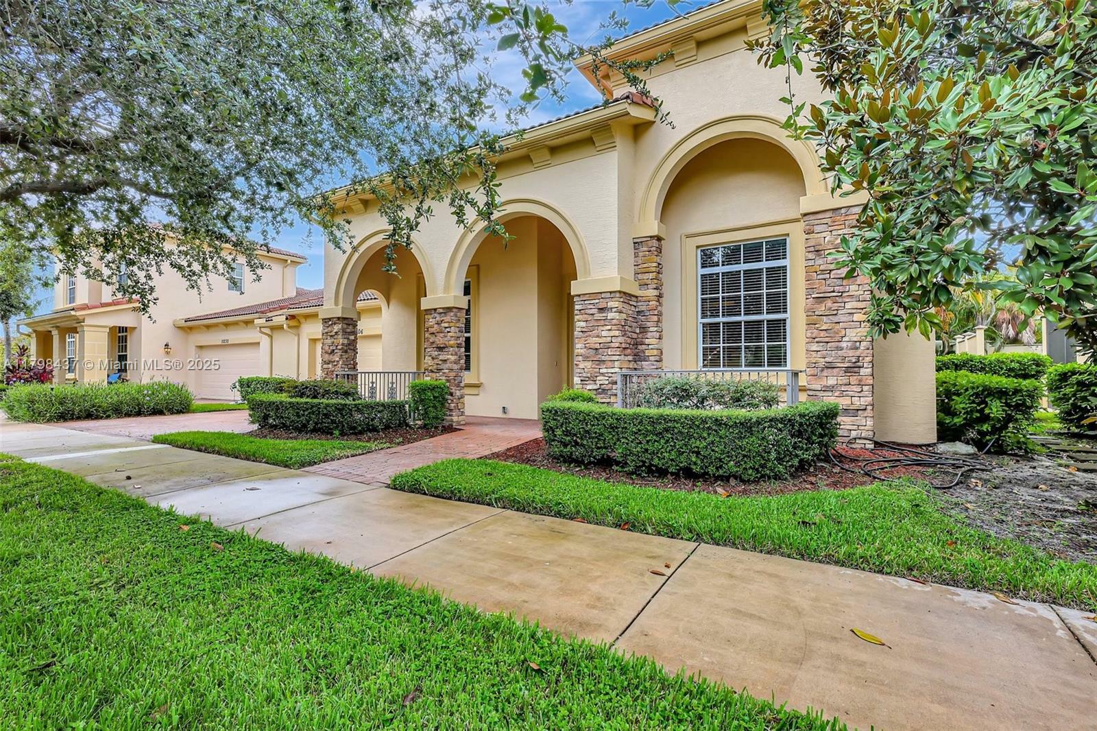 Property Photo: 10206 SW Ambrose Way FL 34986