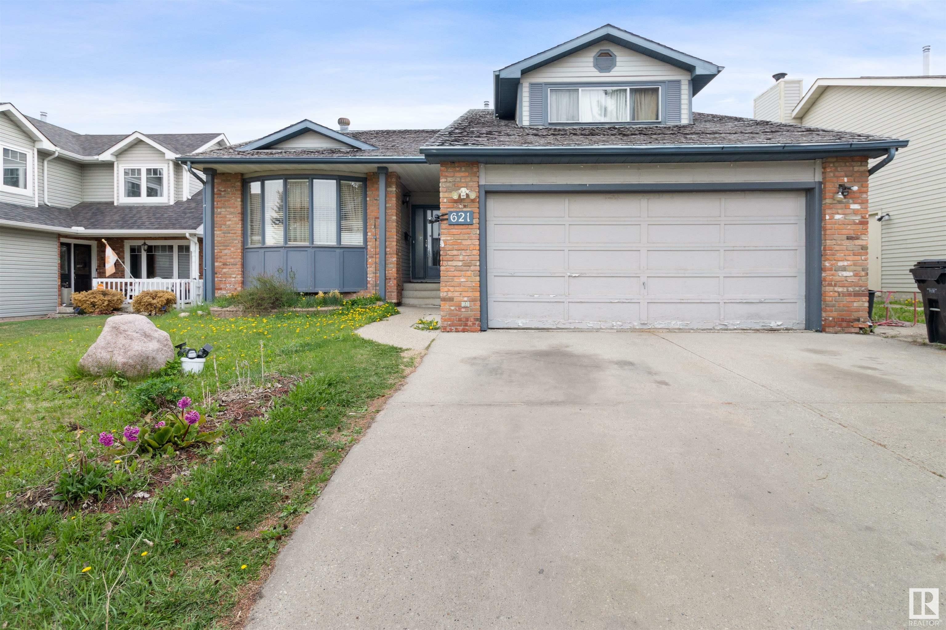 Property Photo: 621 Village Drive AB T8A 4K7
