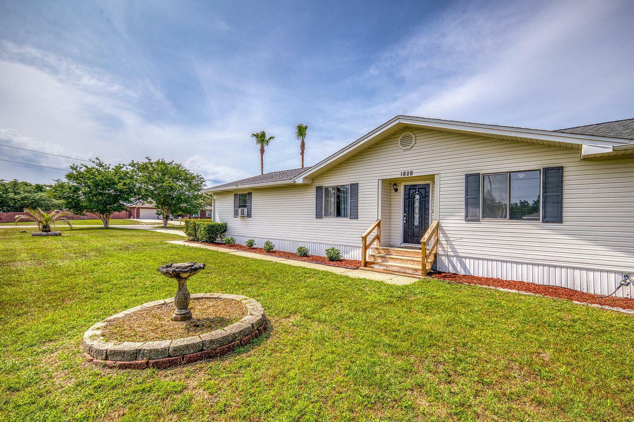 Property Photo: 1828 Sundown Drive FL 32566