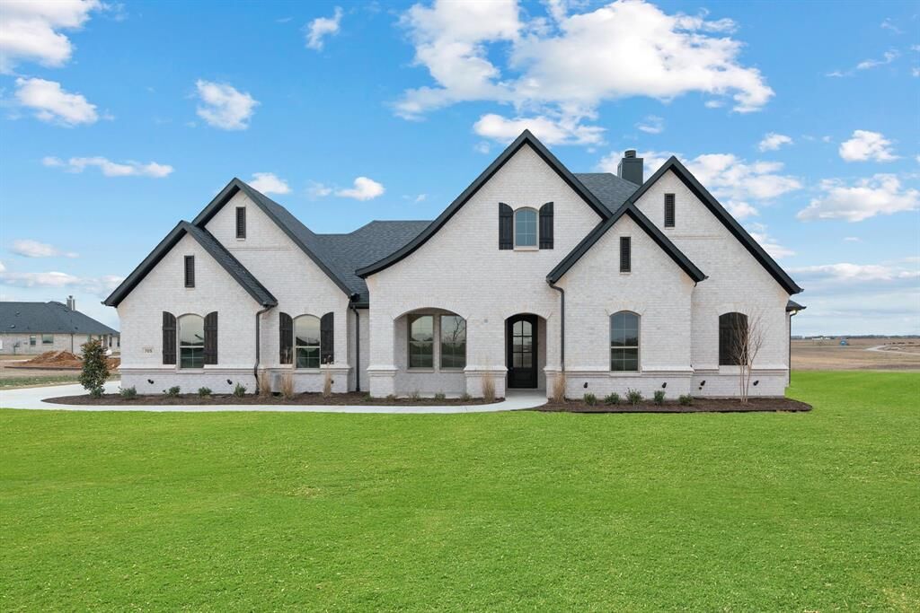 Property Photo: 705 County Road 4530 TX 76234