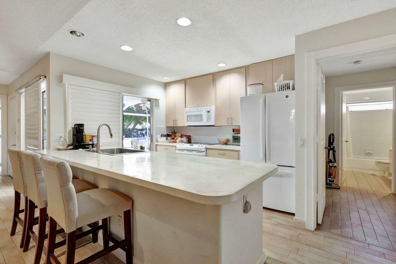 Property Photo: 6903 Geminata Oak Court FL 33410