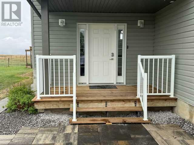 Property Photo: 204 294152 AB T0J 2C0