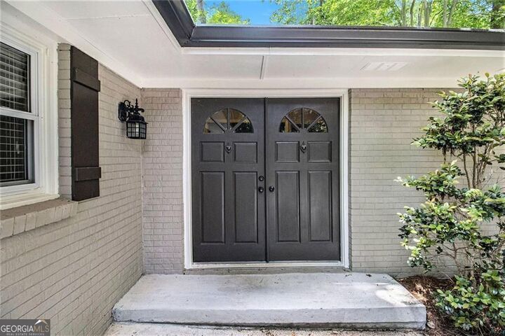 Property Photo:  6590 Williamson Drive NE  GA 30328 