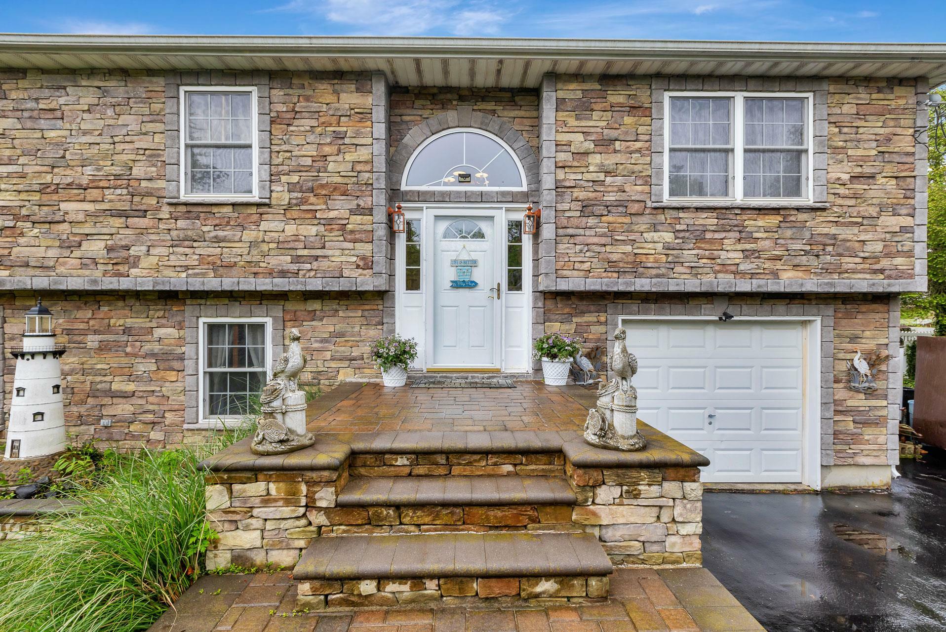 Property Photo: 102 Dahlia Drive NY 11951