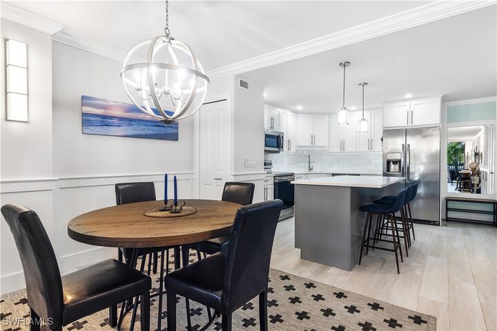 Property Photo: 5 Bluebill Avenue 209 FL 34108