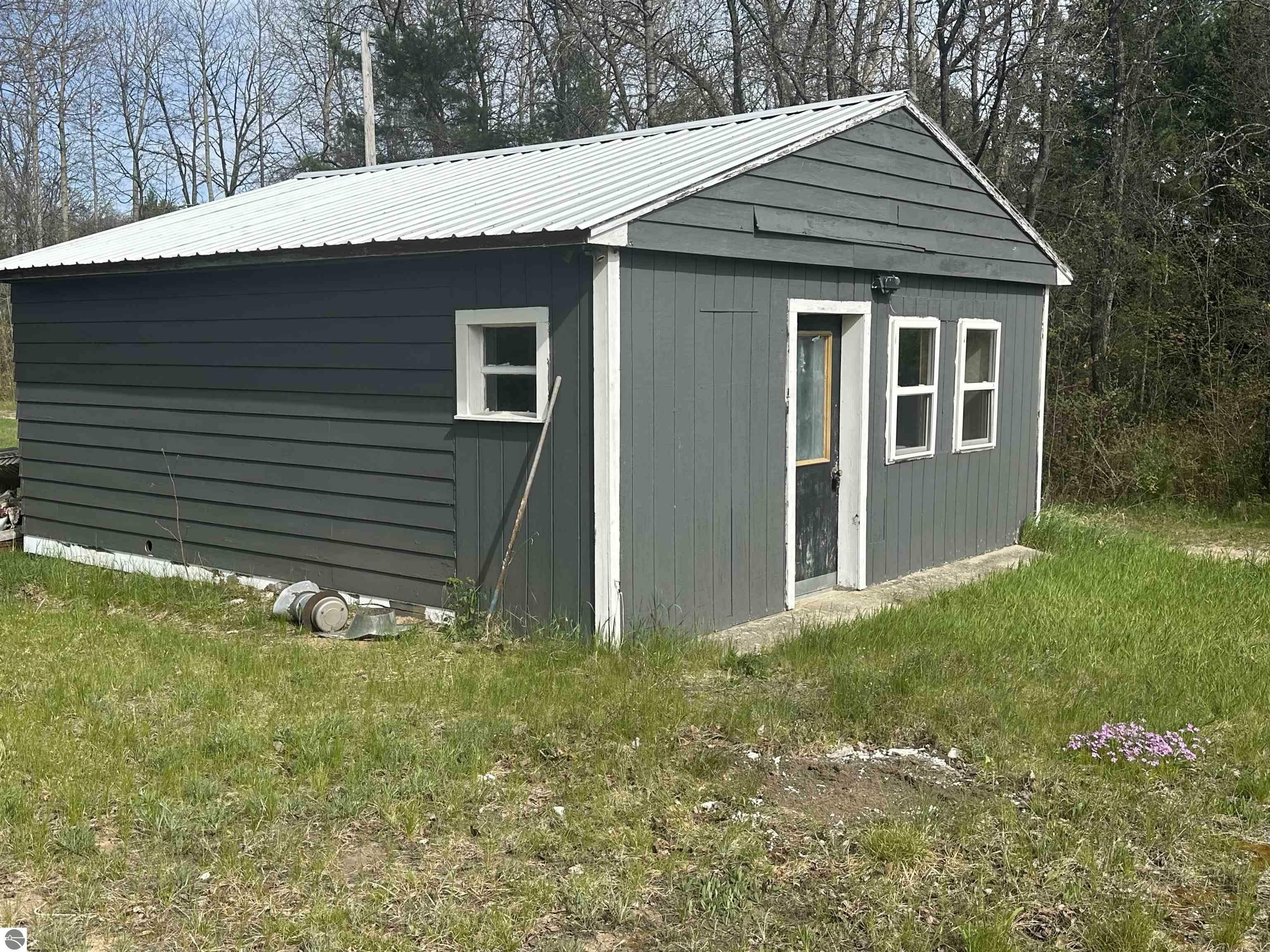 Property Photo: 13036 M-115 MI 49665