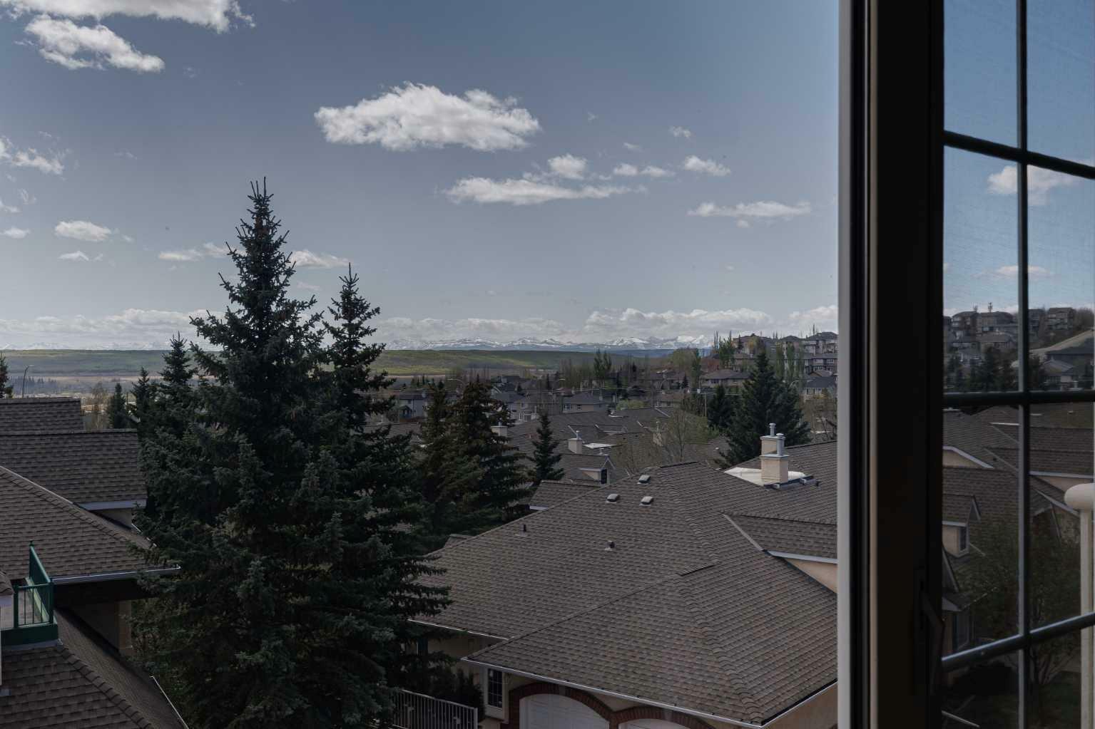 Property Photo: 1000 Sienna Park Green SW 1315 AB T3H 3N7