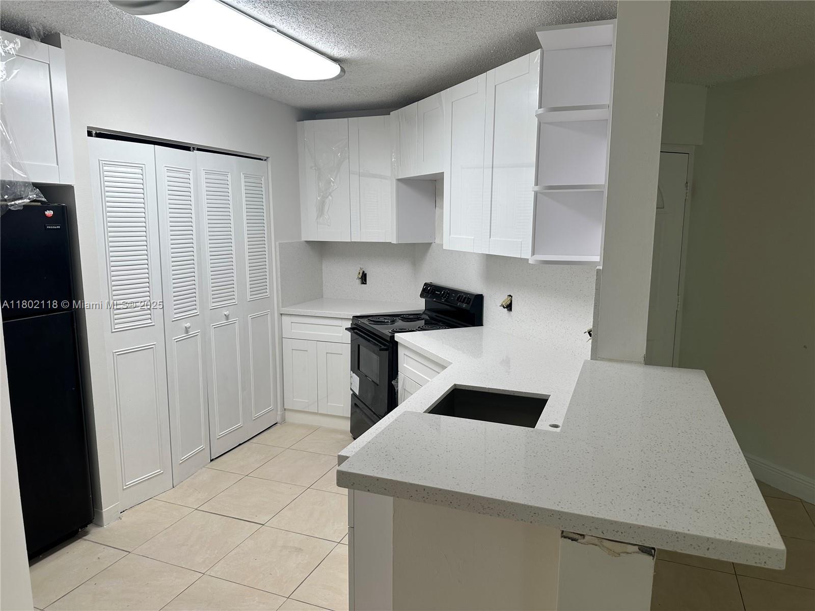 Property Photo: 6280 NW 186th St 212 FL 33015
