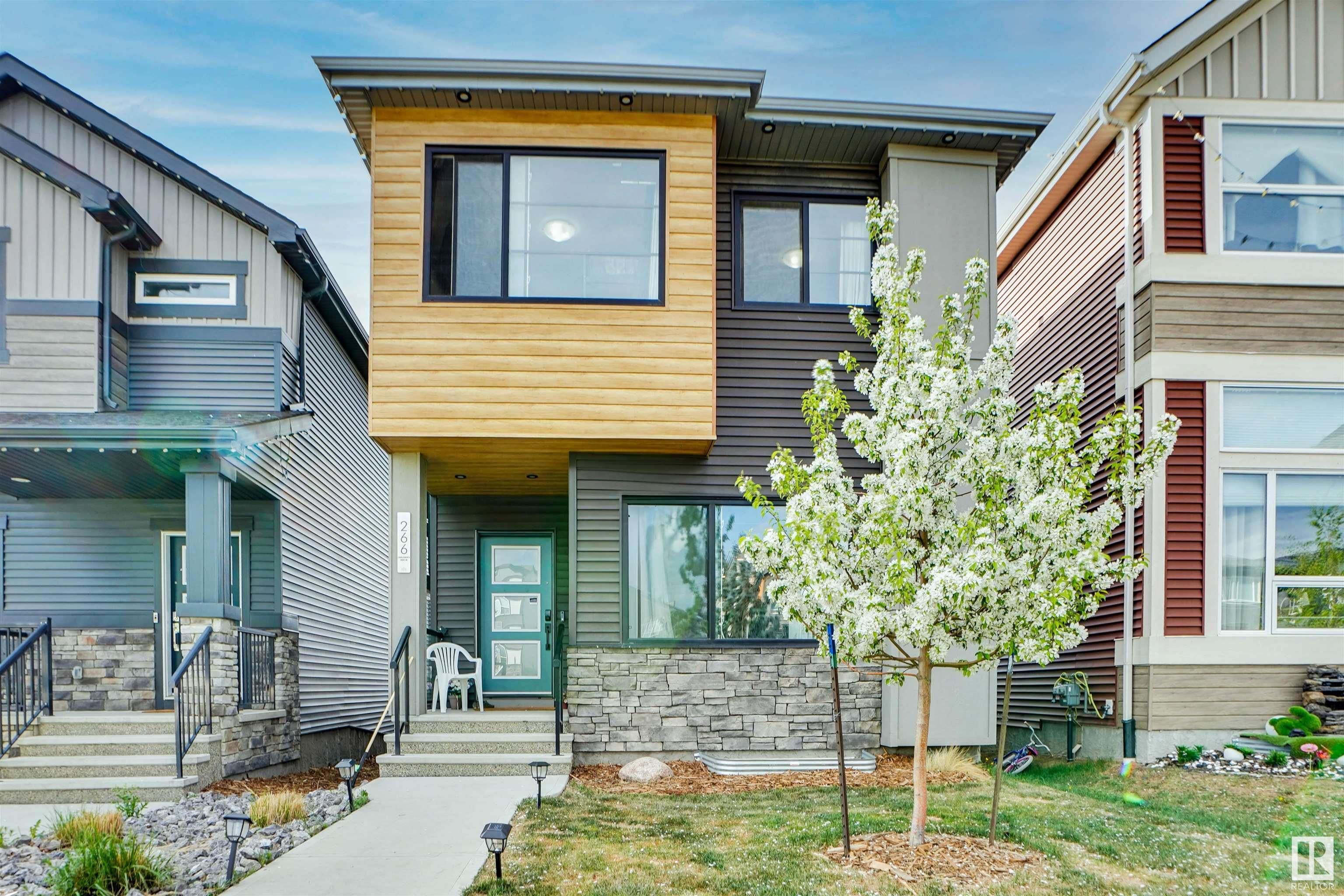 Property Photo: 266 Charlesworth Drive SW AB T6X 2P4