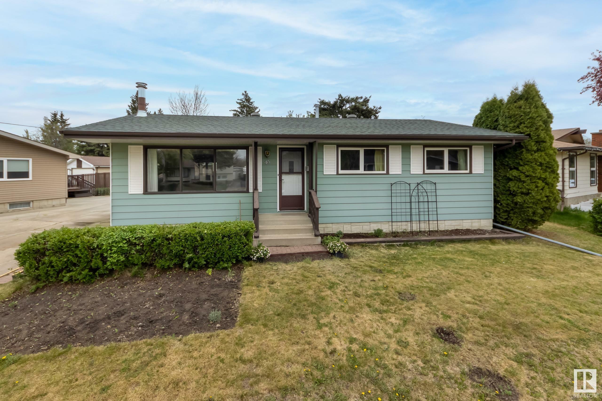 Property Photo: 45 Meadowbrook Road AB T8A 0P2