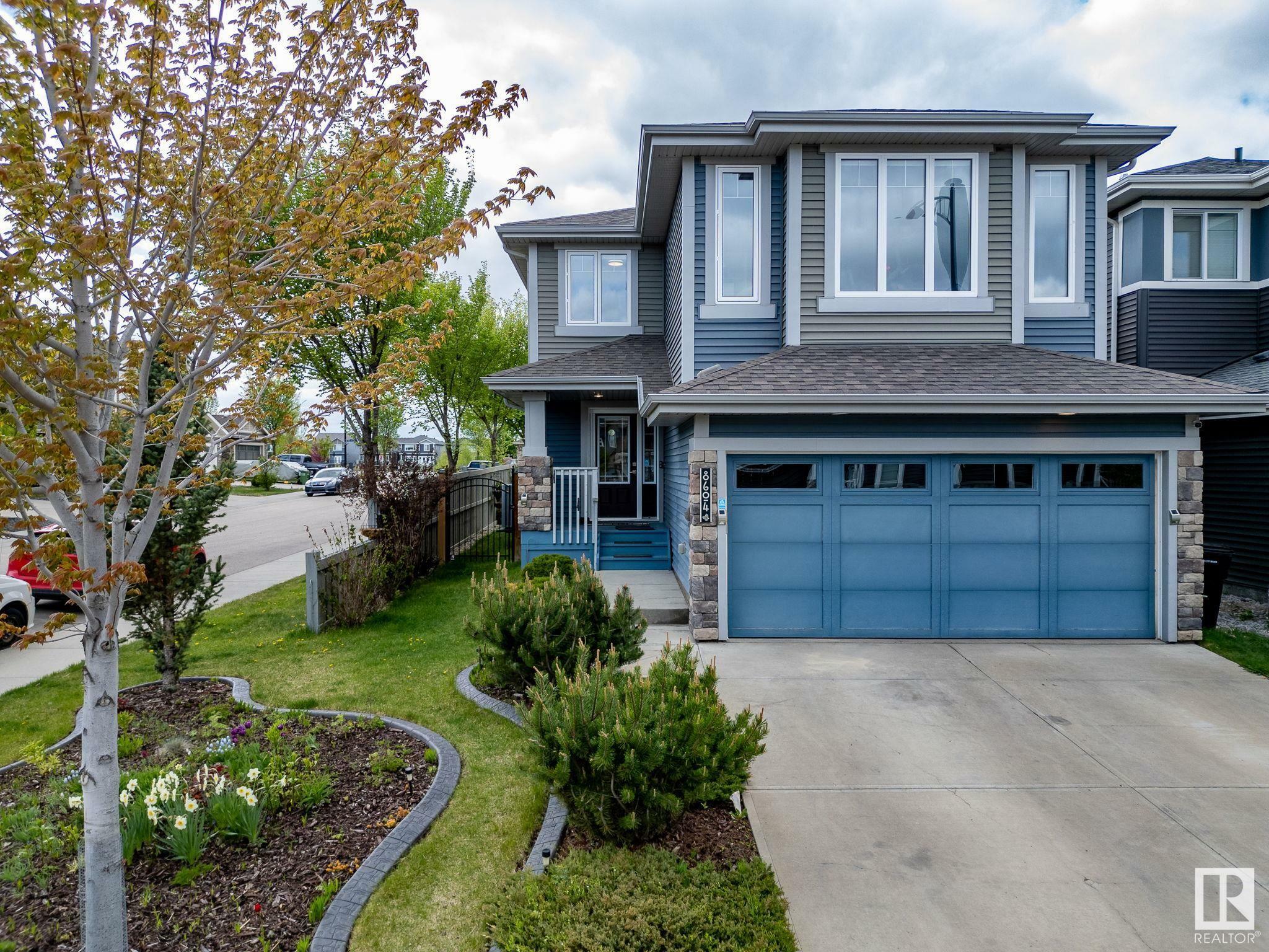 Property Photo: 8604 217 Street NW AB T5T 4R5