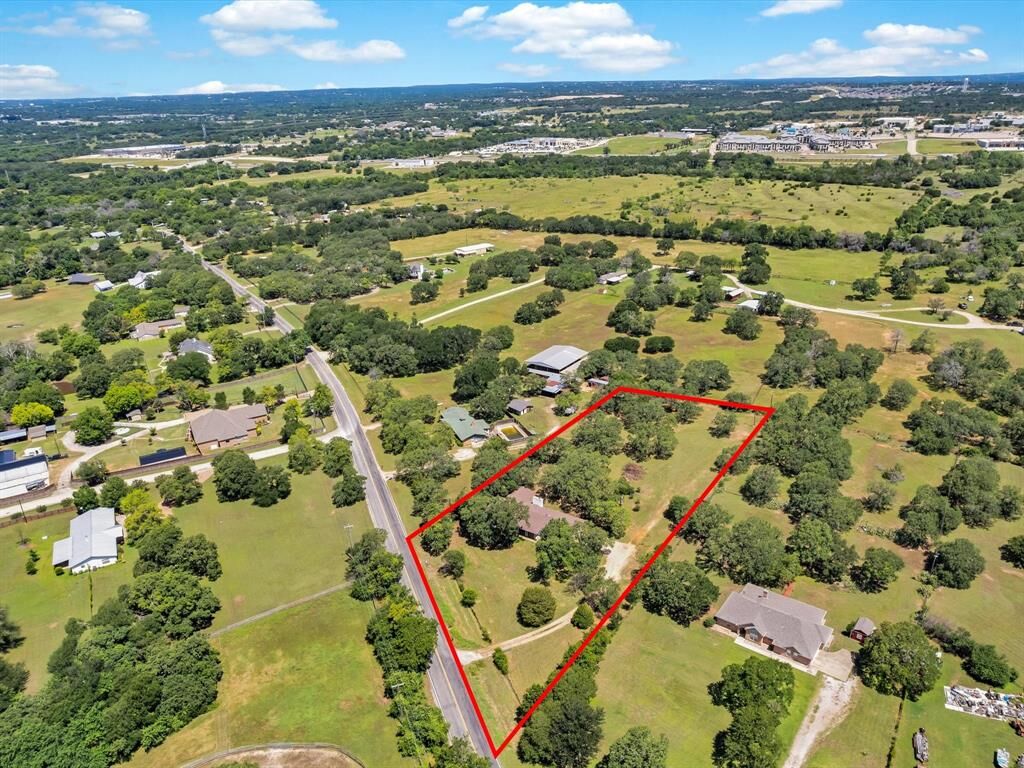 Property Photo:  4109 E Bankhead Highway  TX 76087 