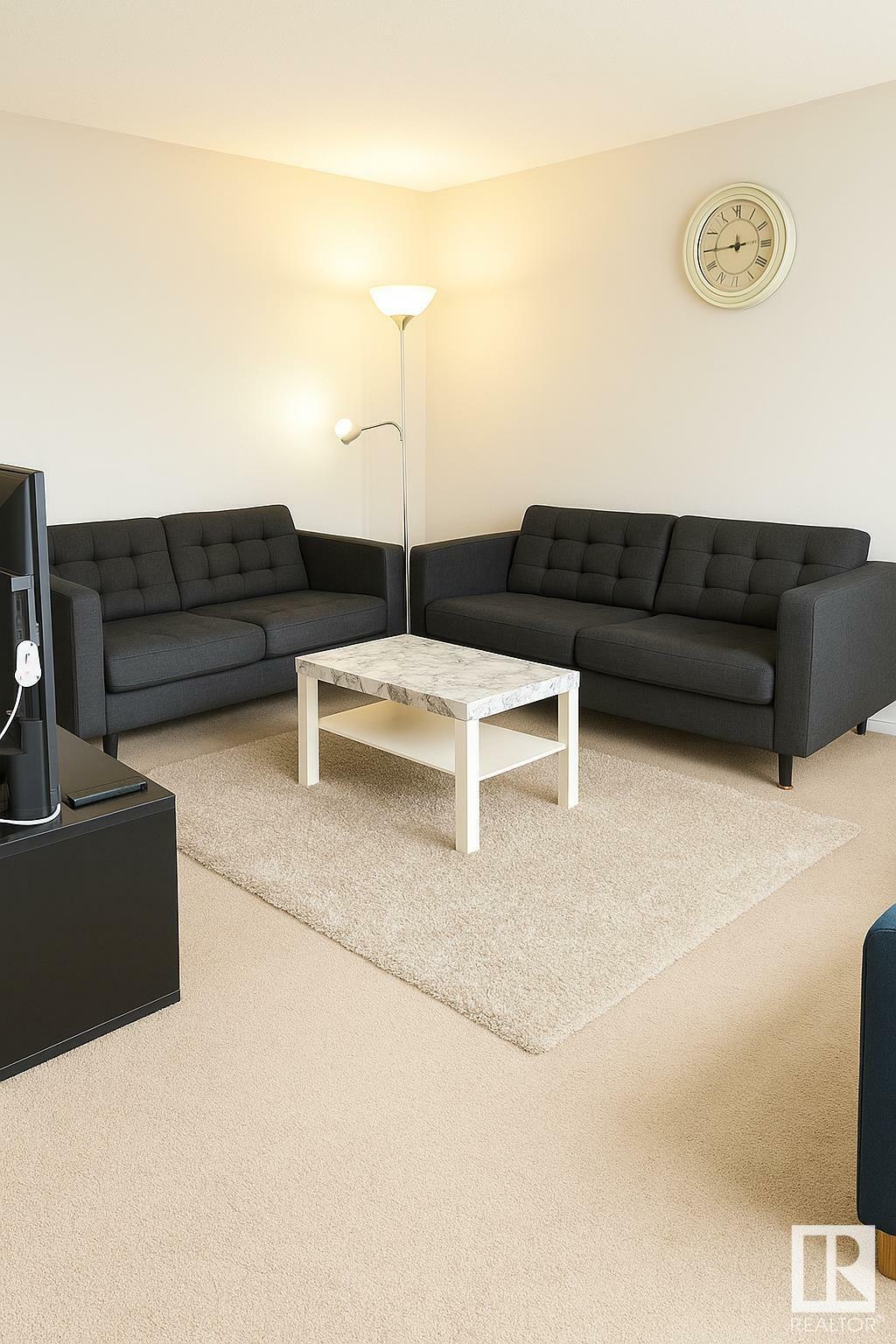 Property Photo: 237 Woodvale Rd NW 105 AB T6L 1E5