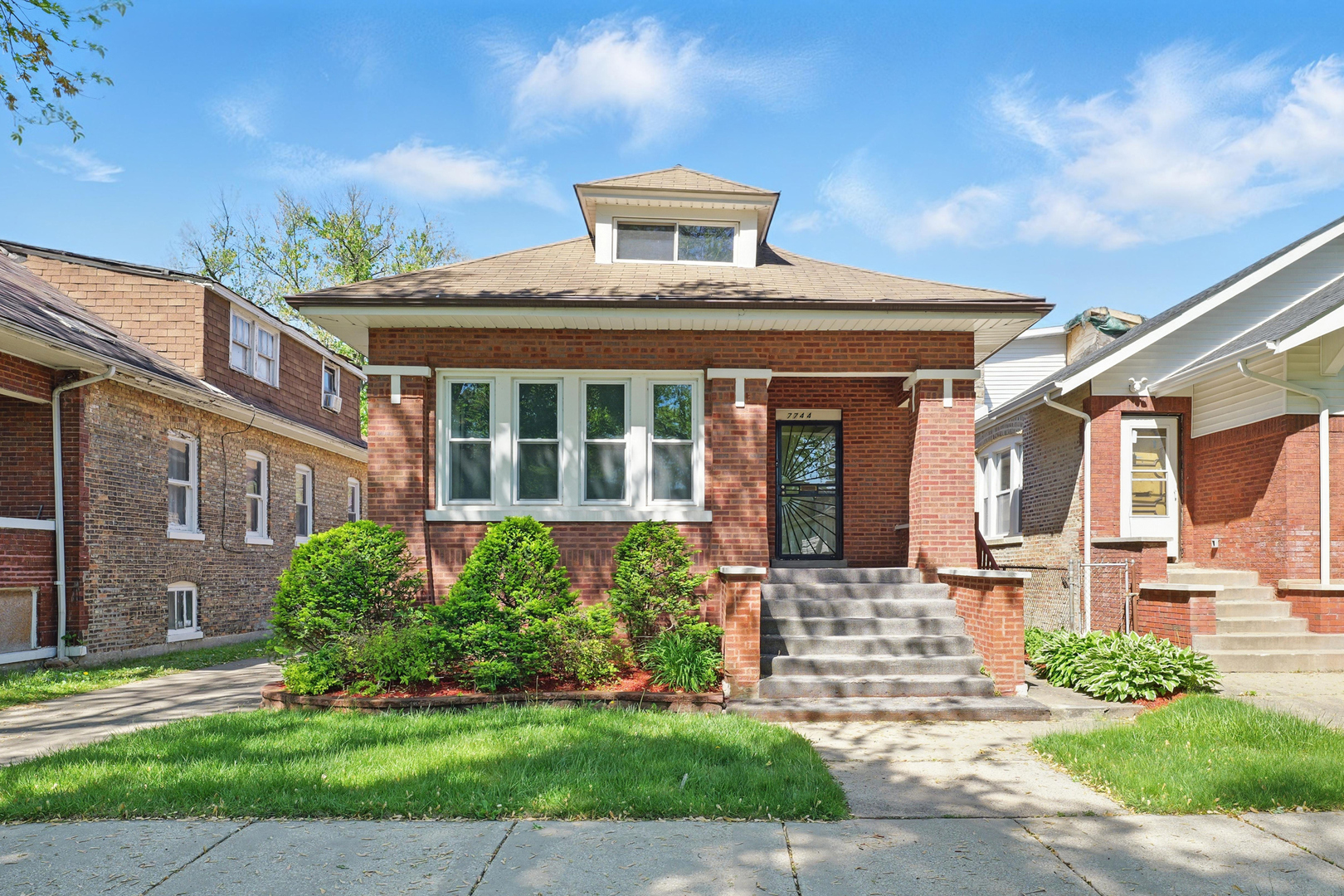 Property Photo: 7744 S Oglesby Avenue IL 60649