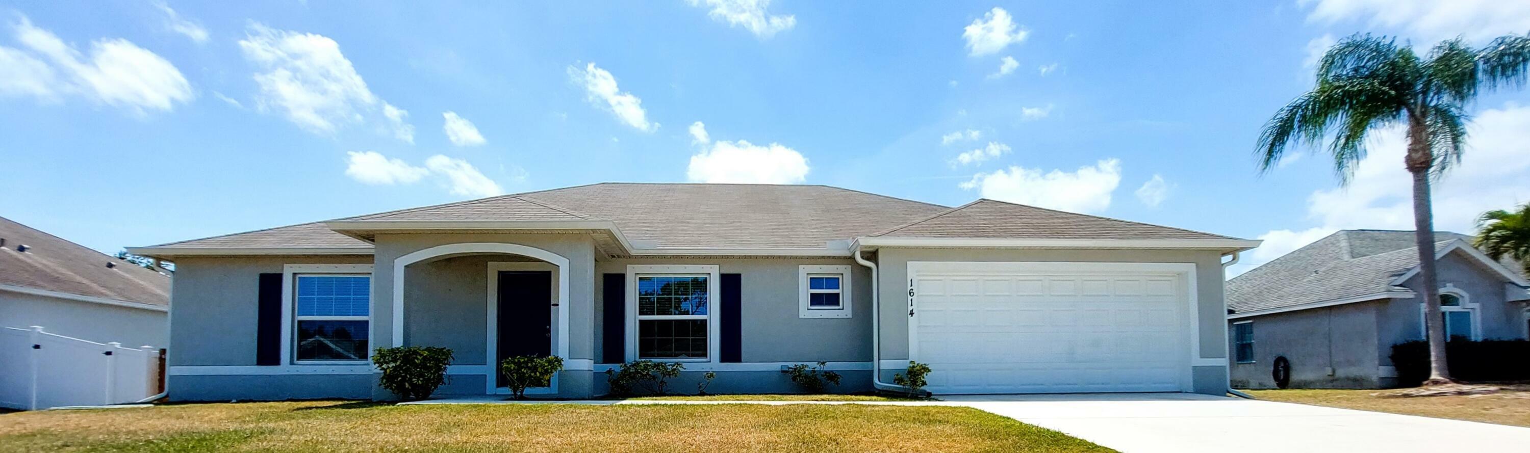 Property Photo: 1614 SW Sylvester Lane FL 34984