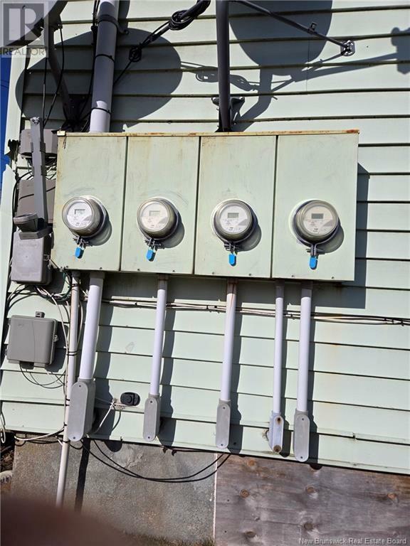 Property Photo: 607-609 Ready NB E2M 3S4
