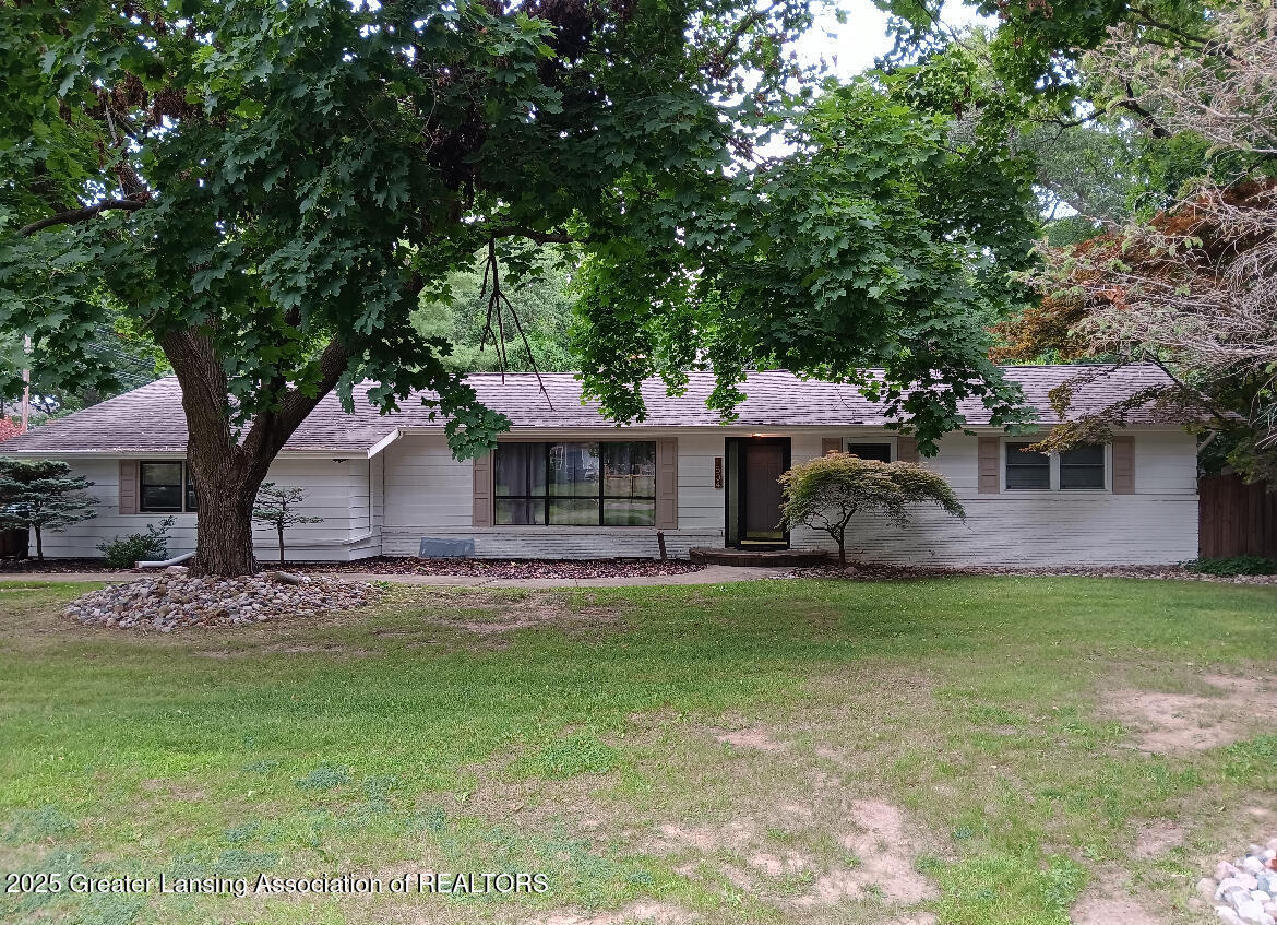 Property Photo:  1504 Forest Hills Drive  MI 48864 