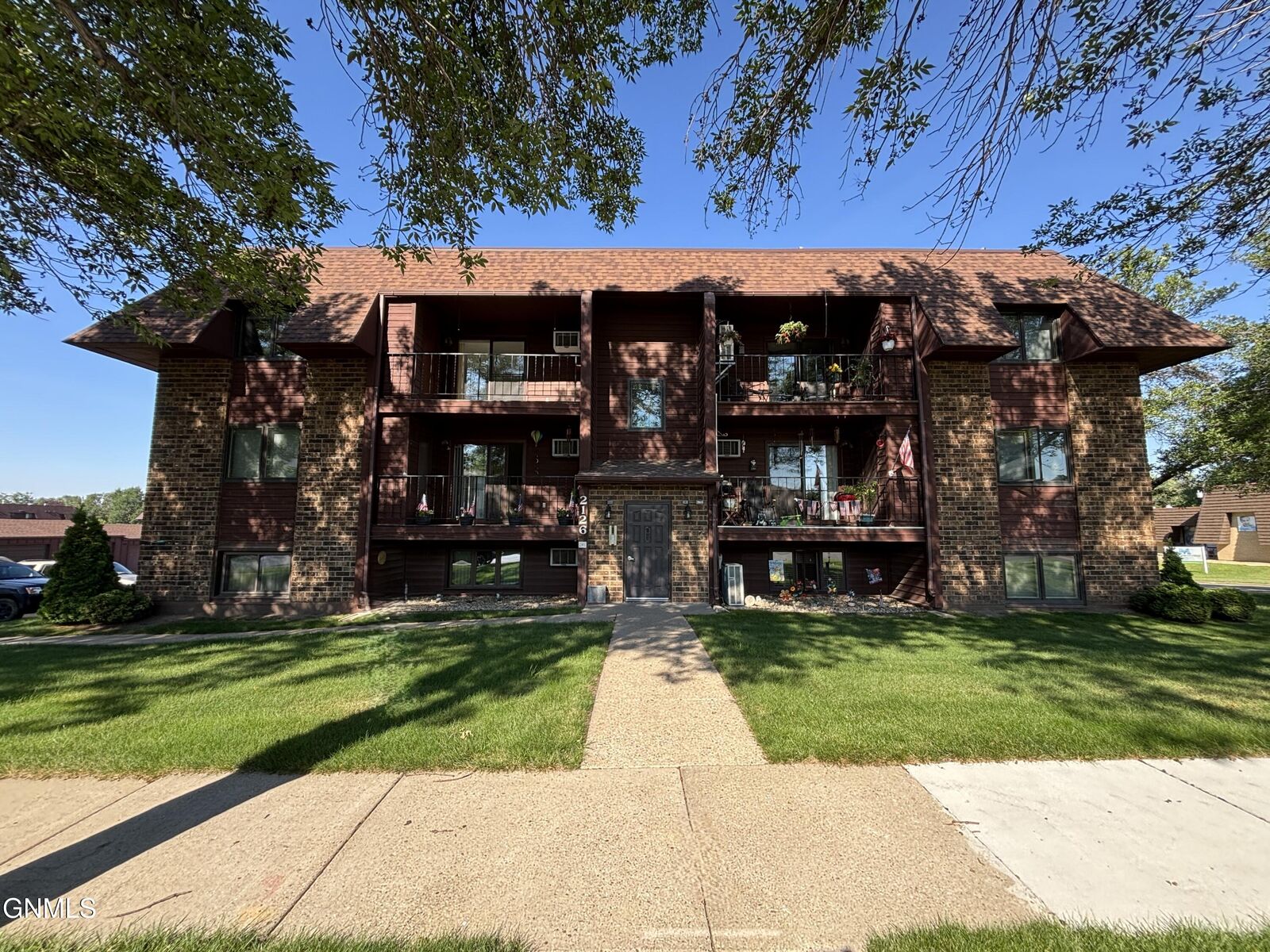Property Photo:  2126 Kavaney Drive N 10  ND 58501 