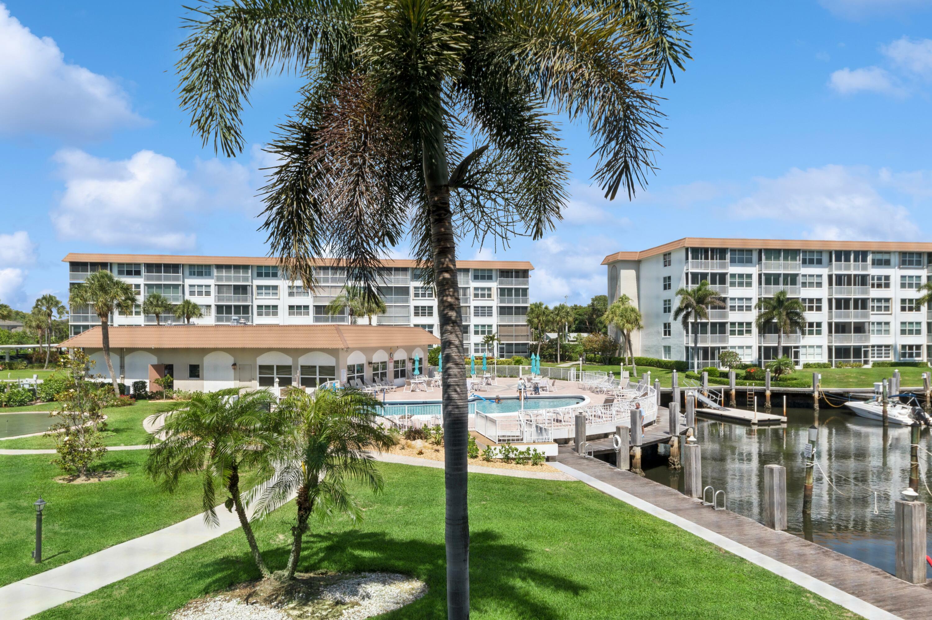 Property Photo: 911 Gardenia Drive 252 FL 33483