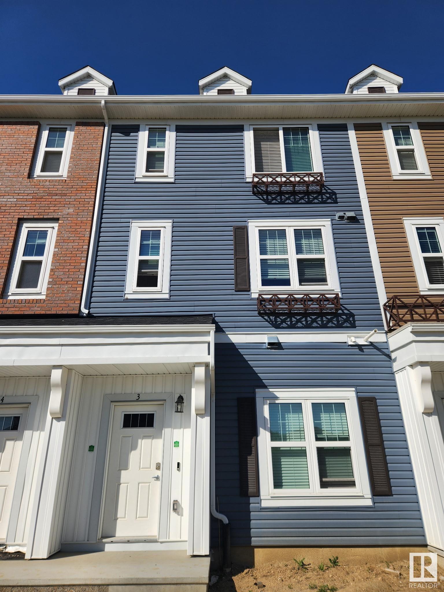 Property Photo: 903 Crystallina Nera Way NW 3 AB T5Z 0N6