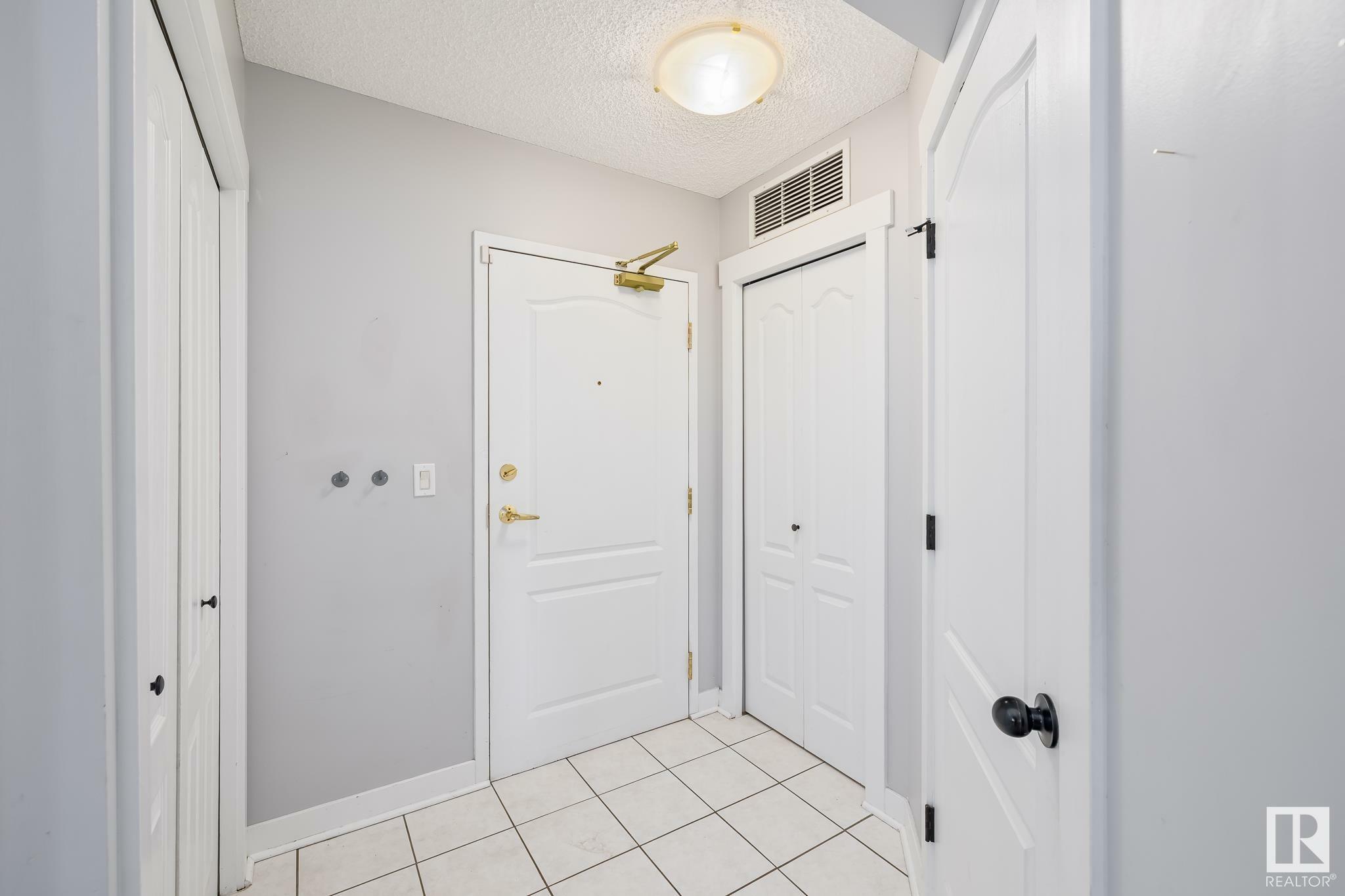 Property Photo: 10909 103 Avenue NW 204 AB T5K 2W7