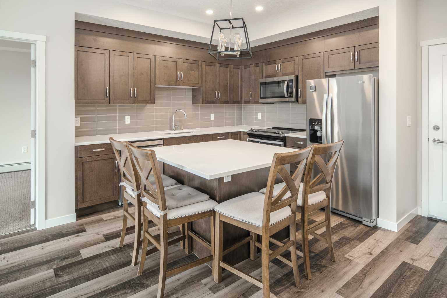 Property Photo: 30 Shawnee Common SW 308 AB T2Y 0R1