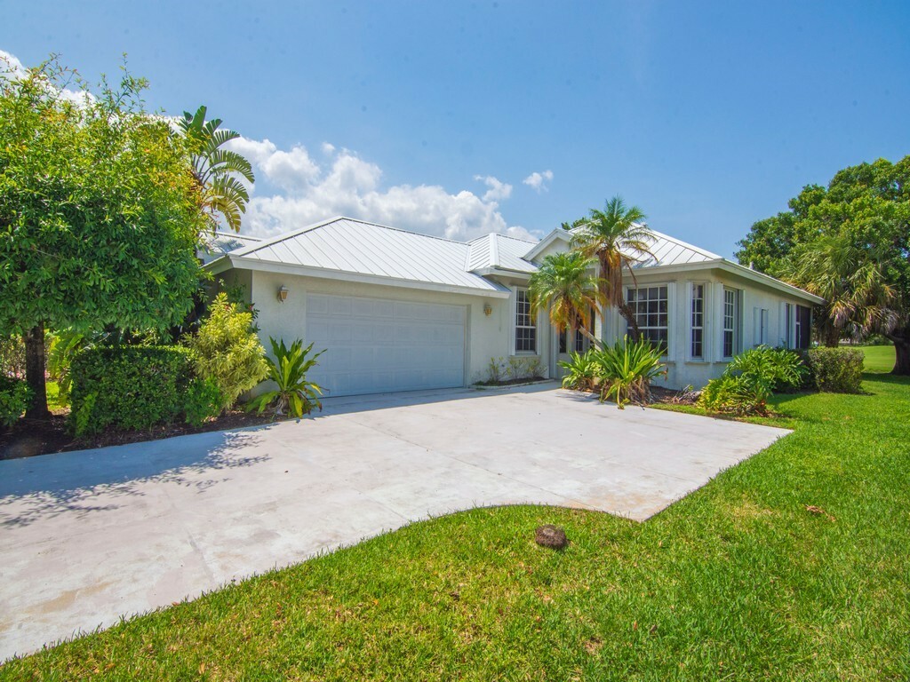 Property Photo: 9412 Poinciana Court FL 34951