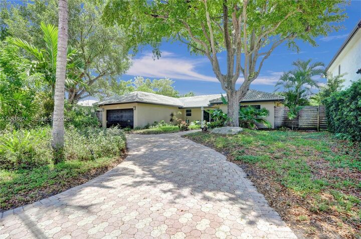 Property Photo:  3100 NE 56th Ct  FL 33308 