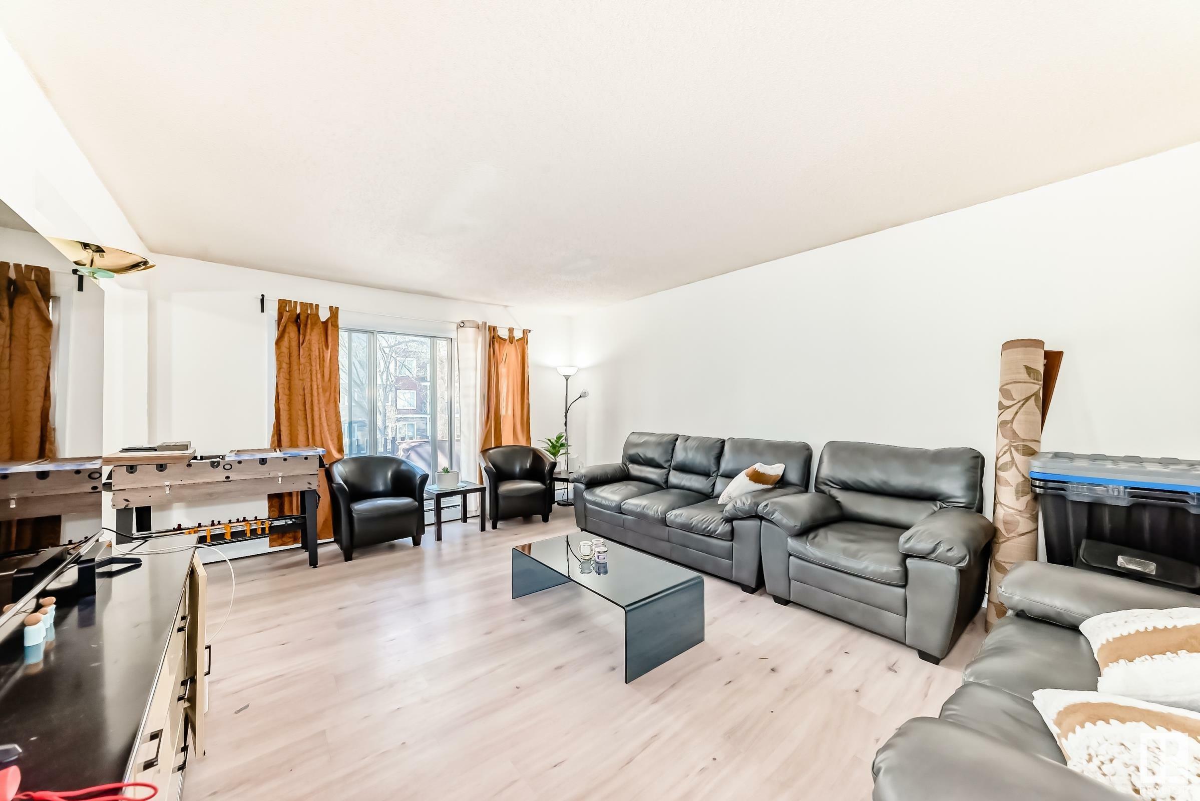 Property Photo: 11907 81 Street NW 207 AB T5B 2S7