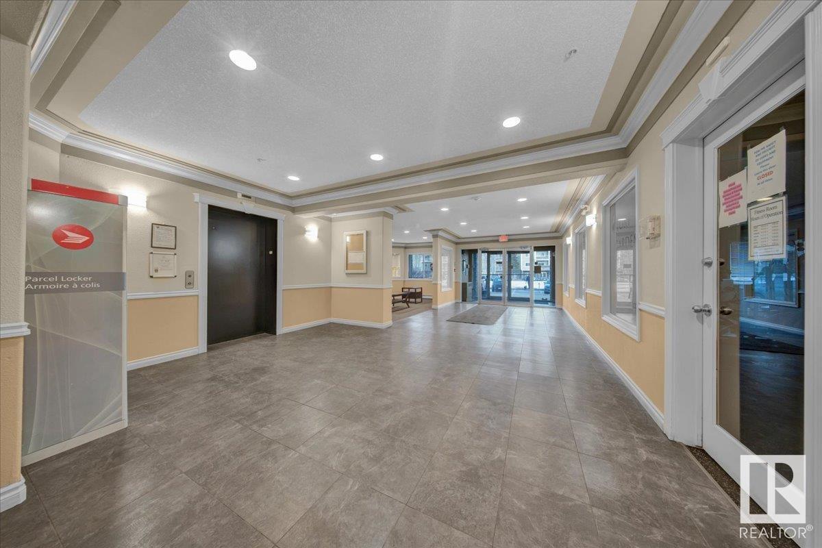 Property Photo: 50 Woodsmere 231 AB T8L 4N9