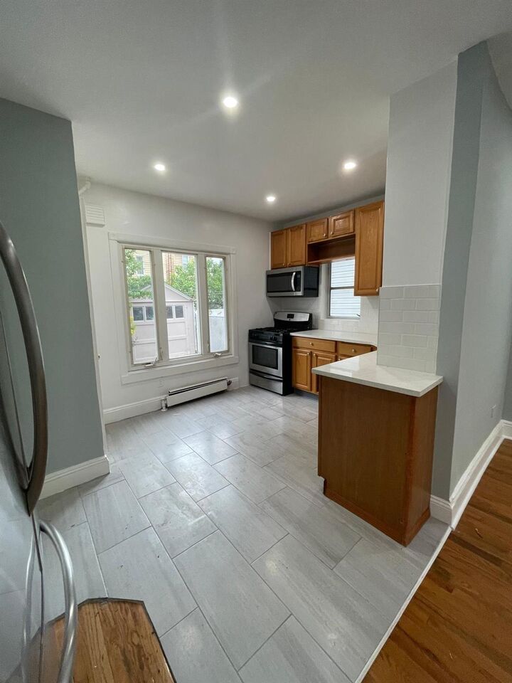 Property Photo:  70-31 71 Place  NY 11385 