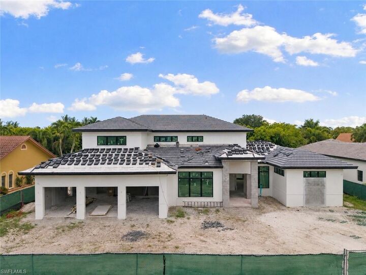 Property Photo: 707 Buttonbush Ln FL 34108