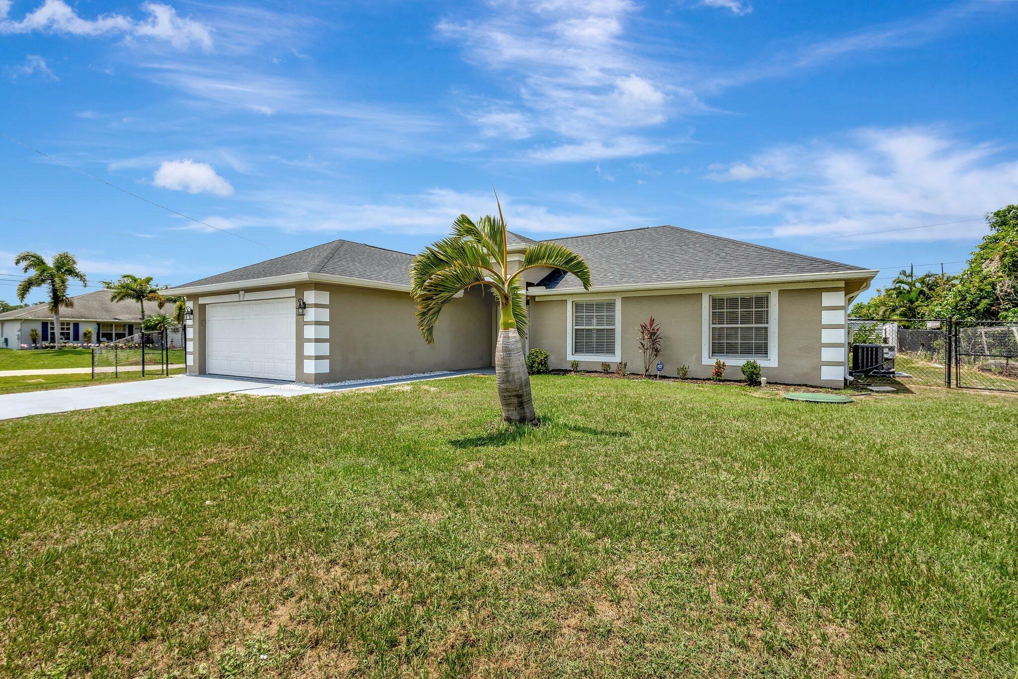 Property Photo: 1897 SW Lofgren Avenue FL 34953
